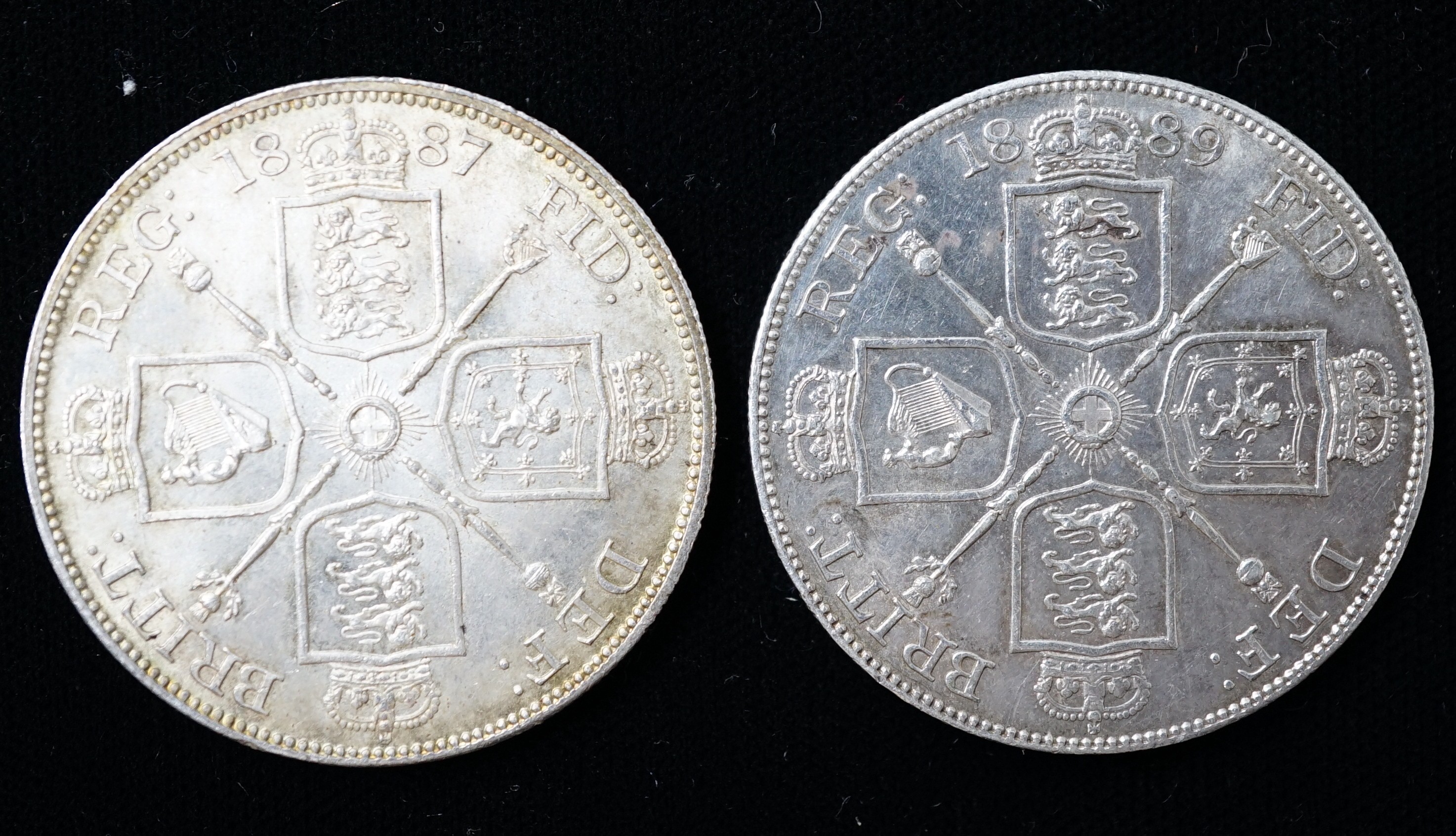 Two Victoria double florins, 1887 EF and 1889, inverted 1 for I in Victoria, cleaned, edge knocks, otherwise EF